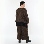 Jacquard Überwurf in schwarzcognacorange mit Kringelmuster oversized Rundhals Langarm