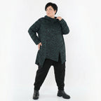 Asymmetrisches Rollkragenshirt mit langen Ärmeln in schwarz petrolgrünem Kringelmuster