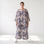 Oversized Shirt aus leichter Viskose Popeline in zartem Rosa mit asymmetrischem Schnitt