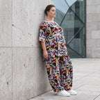Kurzarmshirt aus fließender Viskose in zartem Lila mit femininem Stufenschnitt im Sommer