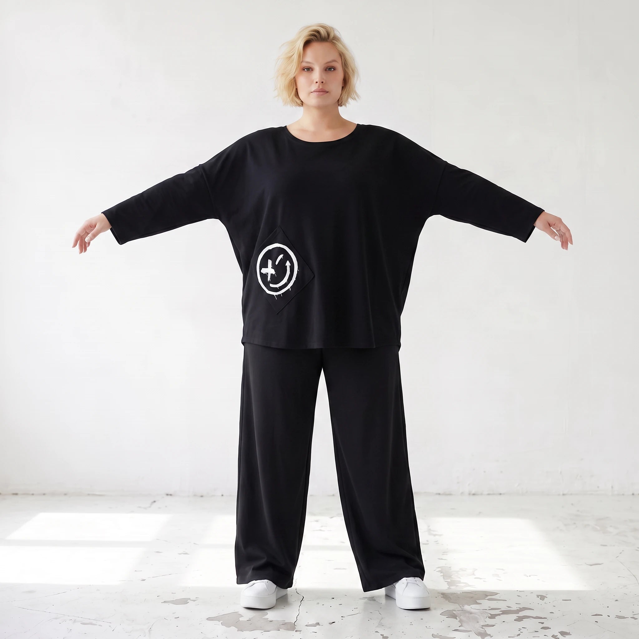 Sweatshirt mit Smileyprint und asymmetrischer Tasche aus weichem French Terry Rundhals