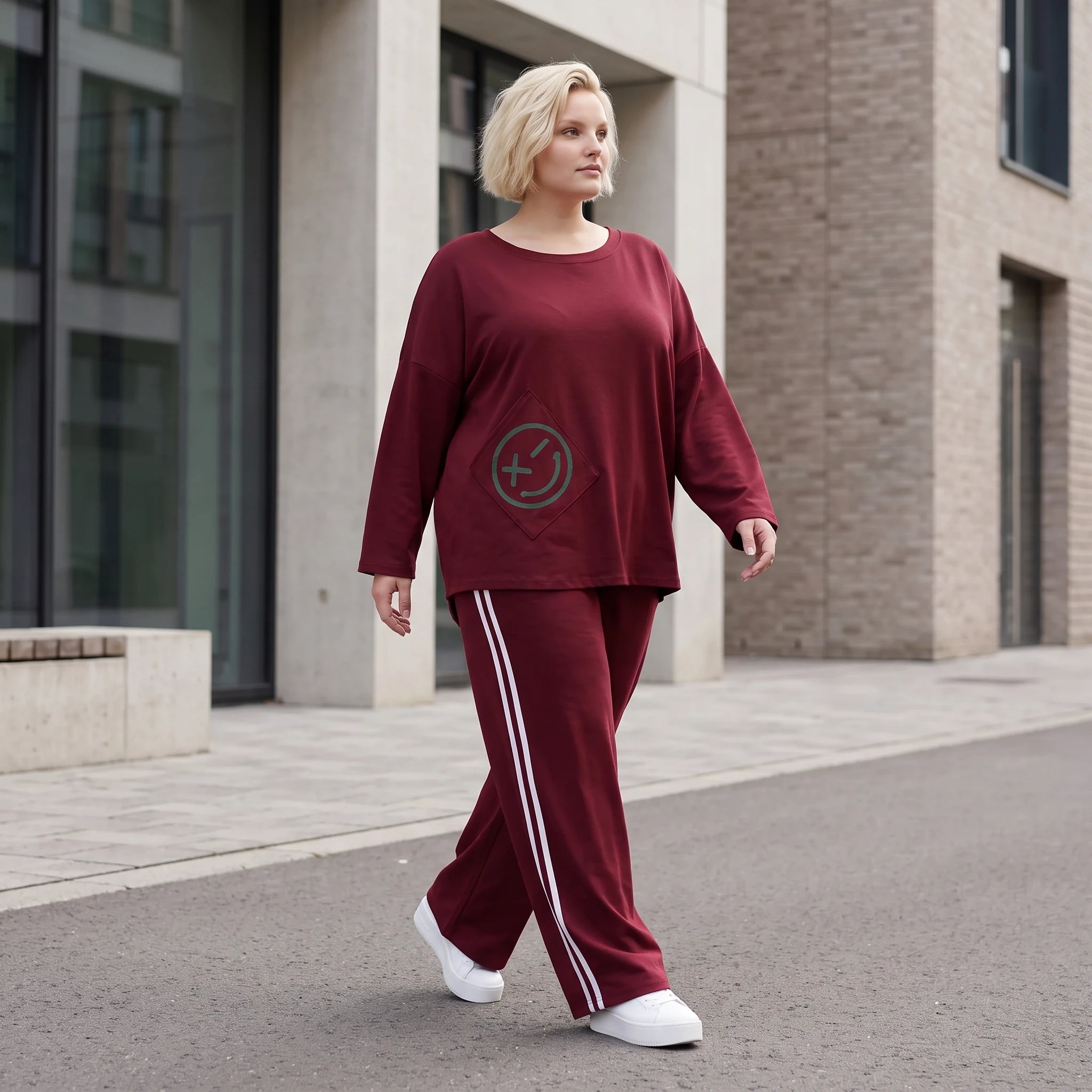 Rote Ballonhose aus French Terry mit Kontraststreifen und elastischem Bund Streetwear