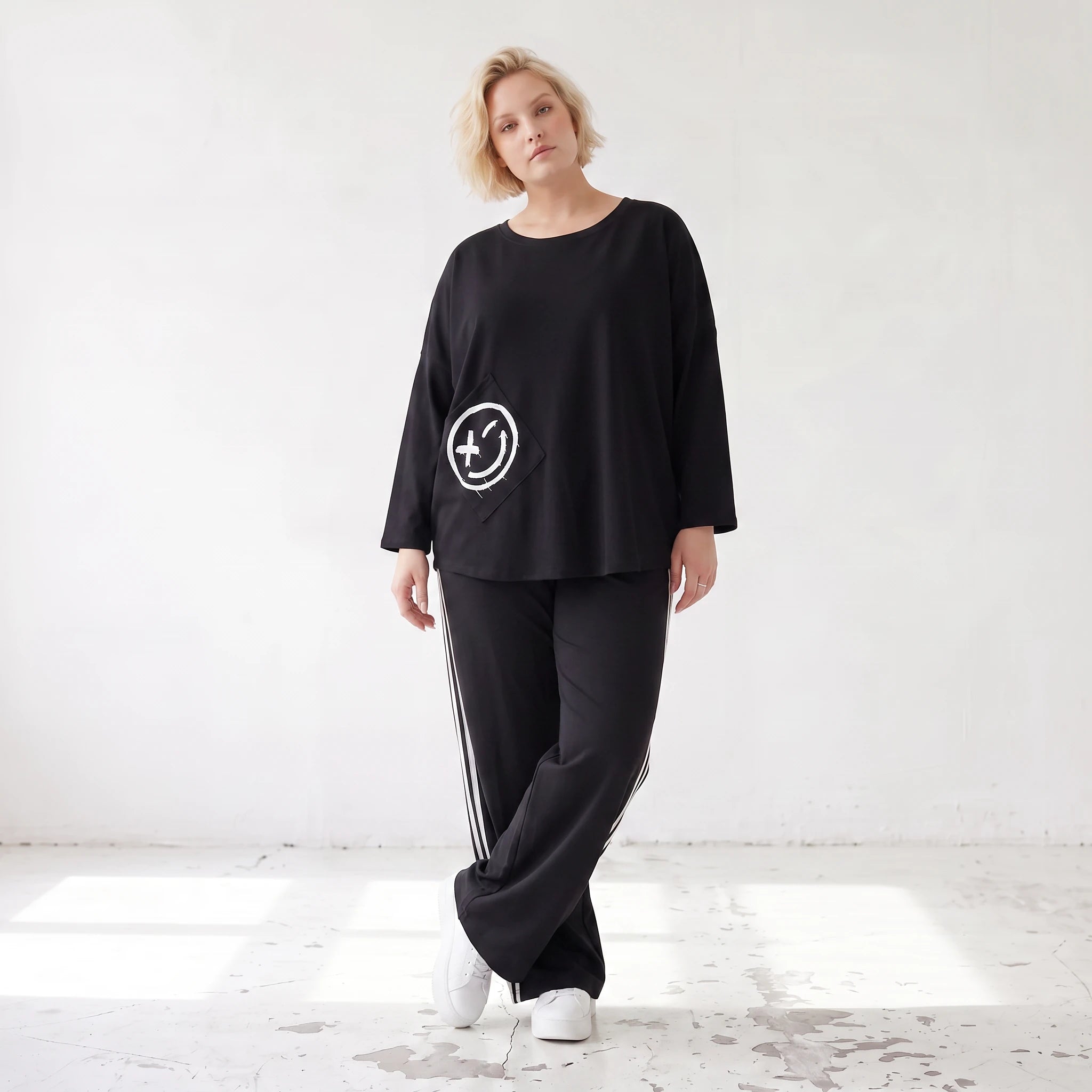 Ballonhose mit elastischem Bund und weissen Kontraststreifen im sportlichen College Look