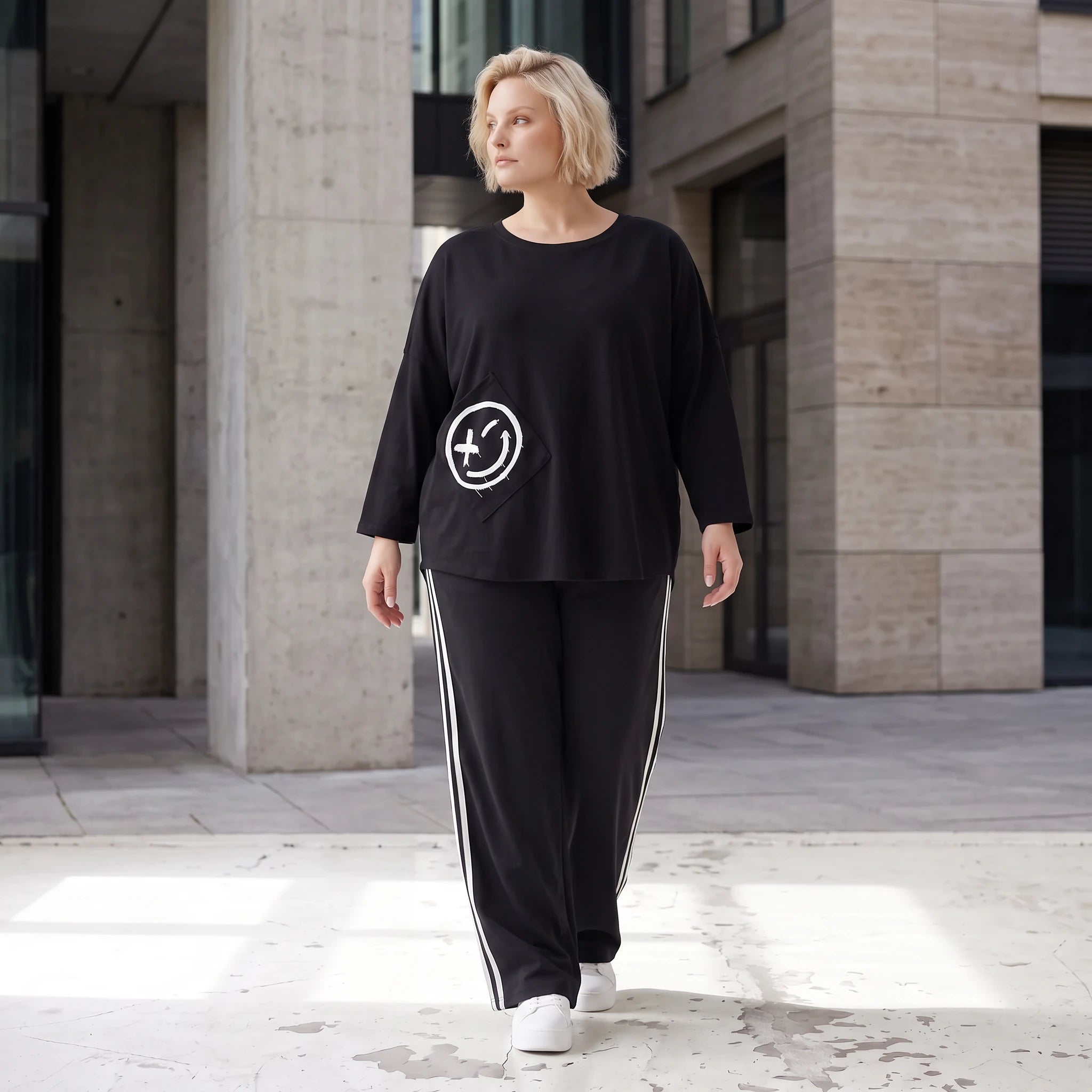 Ballonhose mit elastischem Bund und weissen Kontraststreifen im sportlichen College Look