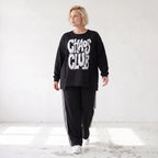 Statementshirt aus French Terry mit Chaos Club Print kastig und vorne kürzer geschnitten