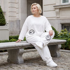 Oversizehose aus warmem French Terry mit Smileyprint gesmoktem Saum und Seitentaschen