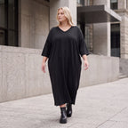 Fließendes A-Linien-Kleid aus Lyocell mit V-Ausschnitt Seitennahttaschen Saumschlitzen
