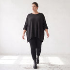 Warmes schwarzes Strickshirt in A-Linie mit Stretch und Destroyedoptik für Winterlooks