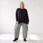 Ballonhose aus Bengaline in Schwarz/Weiß mit Stretch elastischem Bund und Fransentaschen