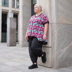 Asymmetrische Vokuhilaweste aus Jersey und Netzstoff im Materialmix vorne kurz hinten lang