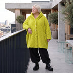 Flauschige limette Teddyjacke in Ballonform mit Kapuze und Taschen für Winterkomfort