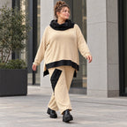 Rollkragenshirt aus Viskosejersey mit Taftdetail asymmetrisch vorne kurz hinten lang