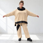 Rollkragenshirt aus Viskosejersey mit Taftdetail asymmetrisch vorne kurz hinten lang
