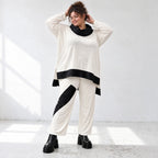 Rollkragenshirt aus fließendem Jersey mit Stretch Vokuhilaform mit seitlichen Schlitzen