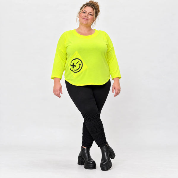 Neongelbes Shirt aus weichem Baumwolljersey mit Rundhalsausschnitt 7/8-Arm und Taschen