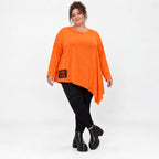Orange Langarmshirt aus weichem Stretchjersey mit asymmetrischem Schnitt und Zipfelsaum