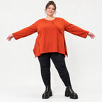 Langarmshirt in Orange mit Rundhalsausschnitt und fließender A-Linie aus Stretchjersey