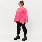 Pinkes Langarmshirt aus weichem Stretchjersey mit Rundhalsausschnitt und lässiger A-Linie