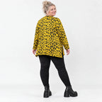 Weiches Langarmshirt aus flauschigem Feinstrick in Gelb/Schwarz mit ausgestellter A-Linie