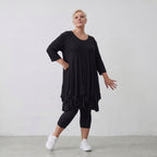 Elastisches Jersey Shirt in Schwarz mit 3/4-Arm Rundhalsausschnitt und weicher Saumraffung