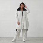 Elegante Ballonjacke aus fließendem Bengaline Stretch mit Hemdkragen in Schwarz und Weiß