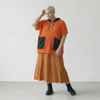 Zeitlos legeres Lagenlook Shirt aus feinem Baumwollstrick mit ausgefallener Lochstruktur, Orange/Schwarz