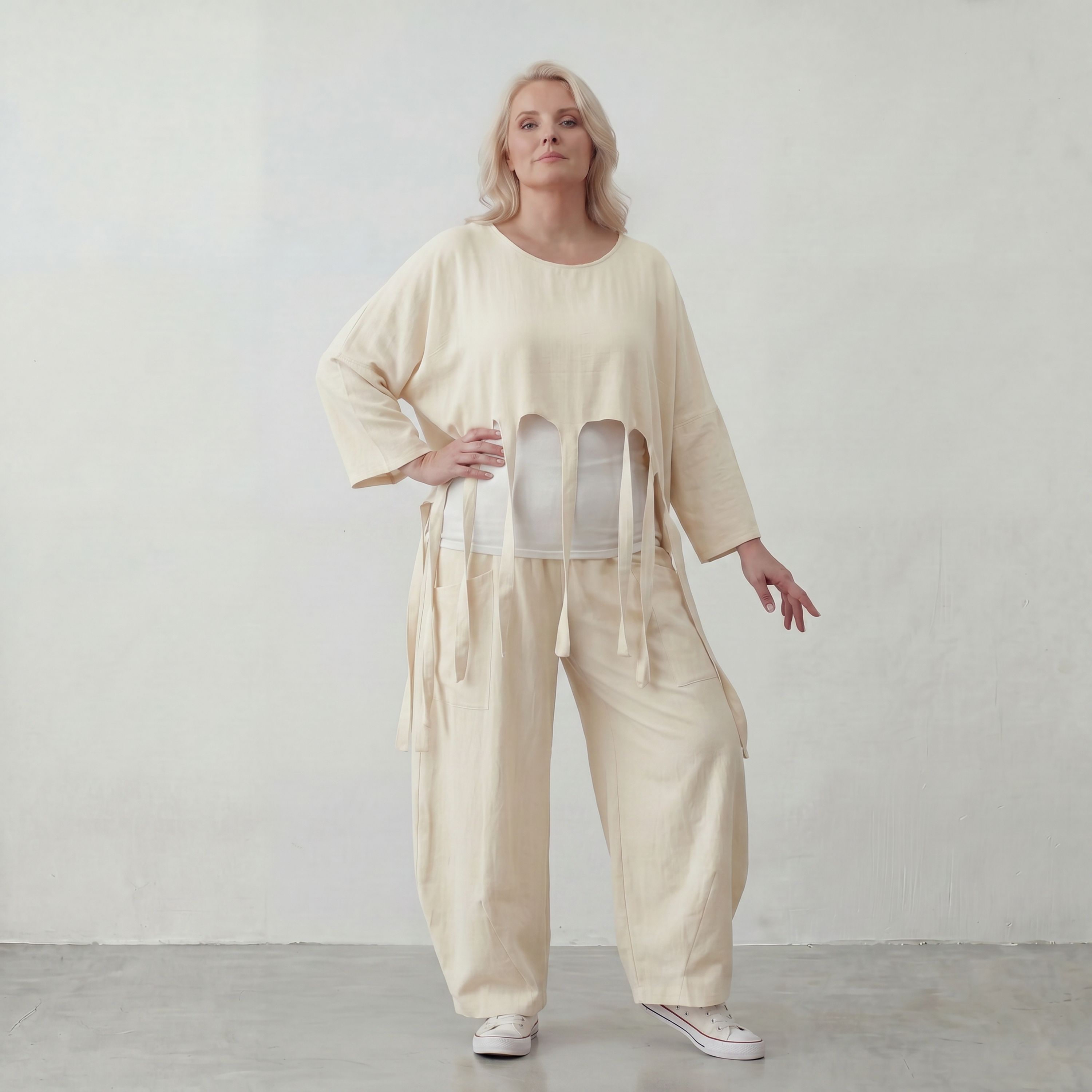 Zeitloser Oversize Lagenlook Überwurf in Creme leger luftig mit Fransen Detail fein soft
