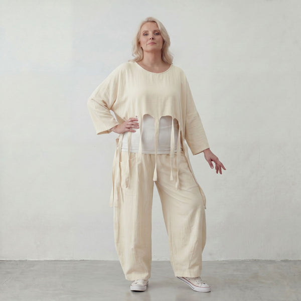 Zeitloser Oversize Lagenlook Überwurf in Creme leger luftig mit Fransen Detail fein soft