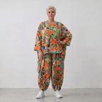 Luftiges Oversized Shirt in frischem Apfelgrün mit Vokuhila Schnitt aus Viskose Leinen