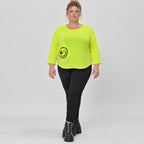 Neongelbes Shirt aus weichem Baumwolljersey mit Rundhalsausschnitt 7/8-Arm und Taschen