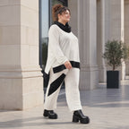 Rollkragenshirt aus fließendem Jersey mit Stretch Vokuhilaform mit seitlichen Schlitzen